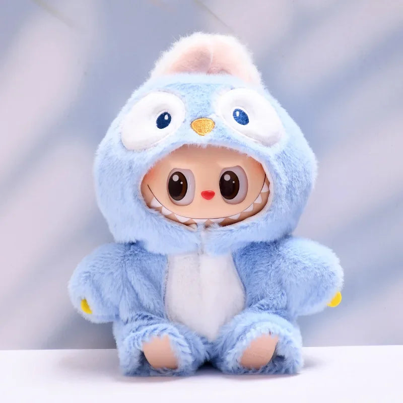 Plush toy with a blue hood and white body on a light gray background