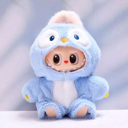 Plush toy with a blue hood and white body on a light gray background